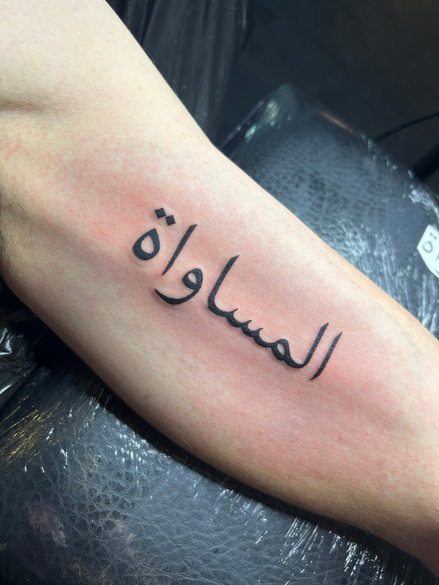 Arabische kalligrafie tattoo
