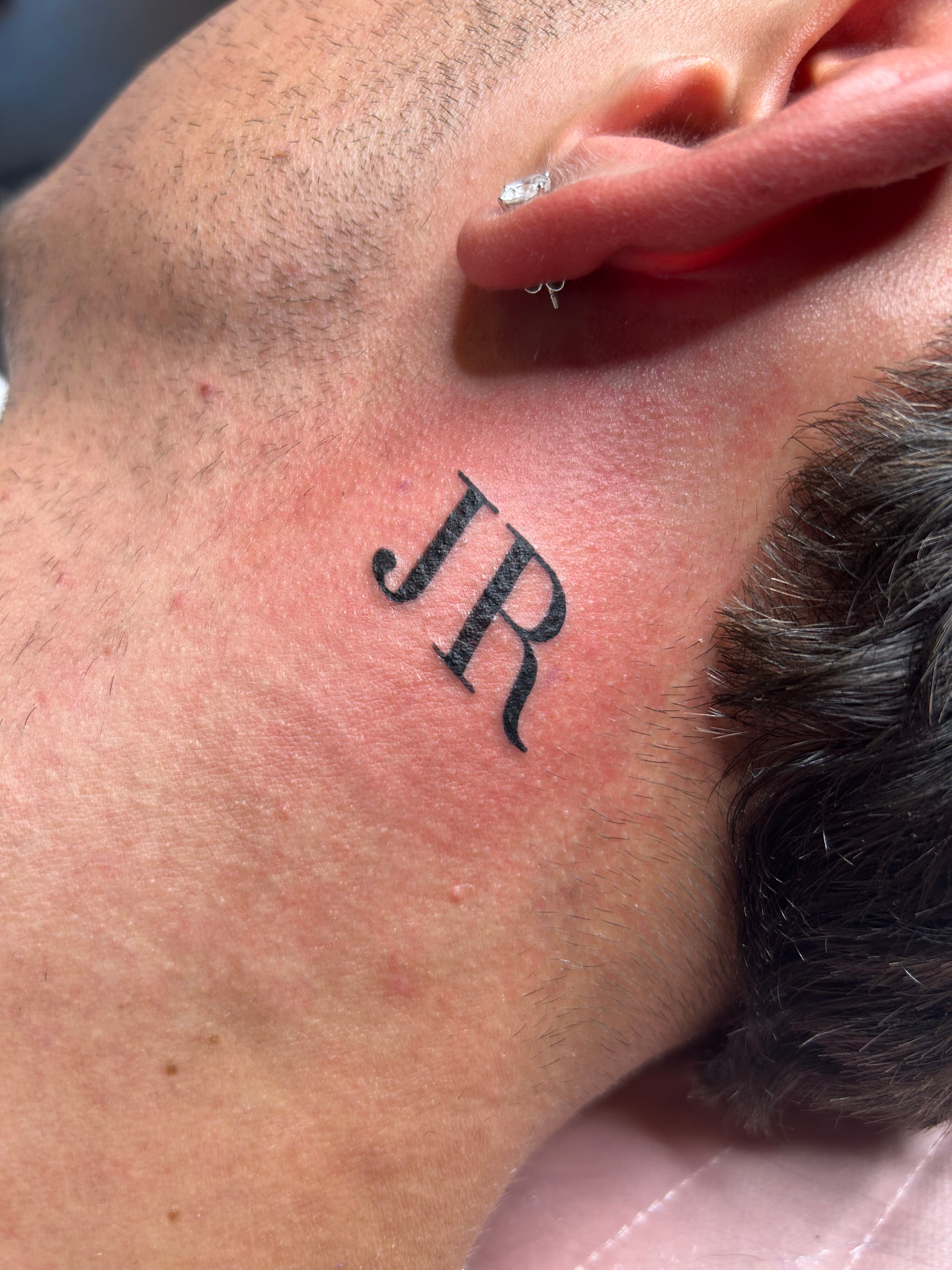 Initialen tattoo