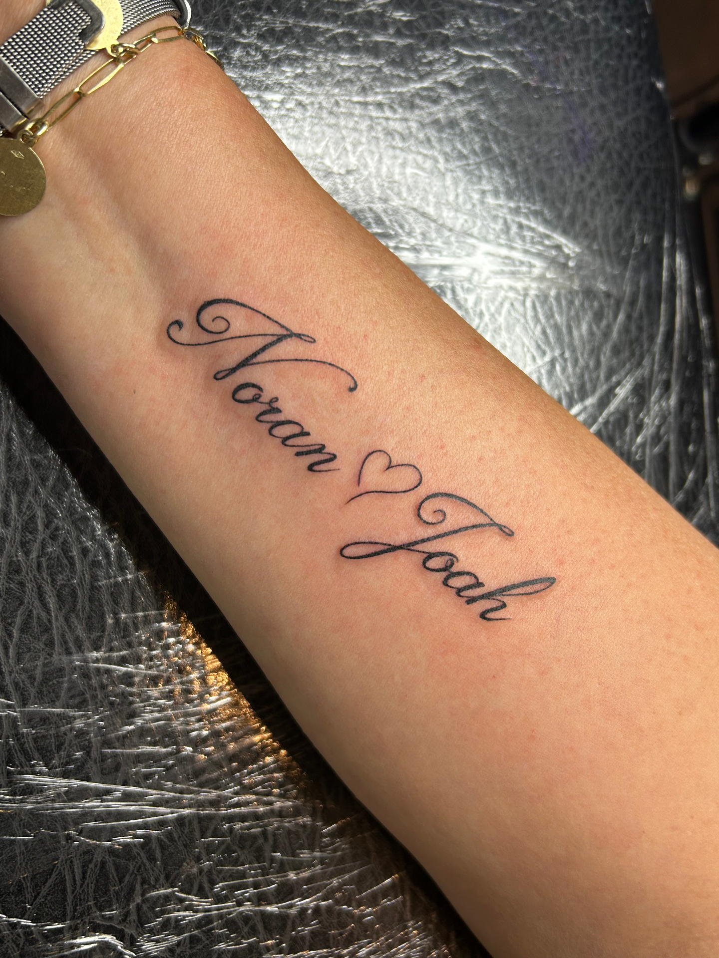 Namen met hartje tattoo